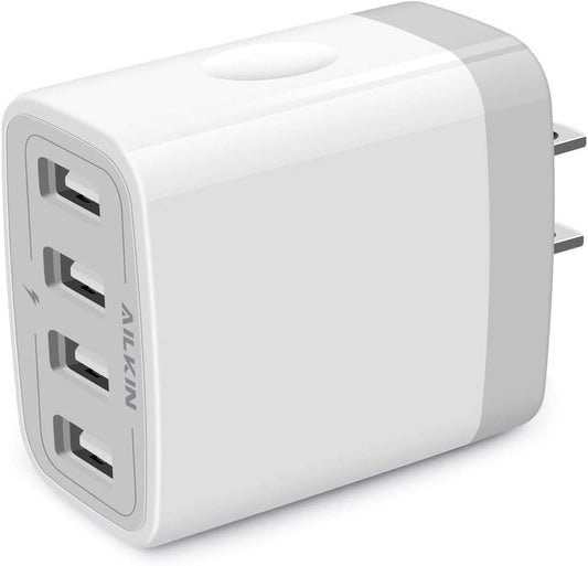 USB wall charger with four ports for smartphones and tablets