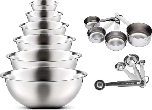 Set of 14 stainless steel mixing bowls with measuring cups and spoons