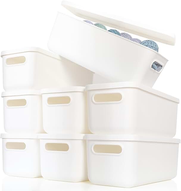 White plastic storage baskets with lids