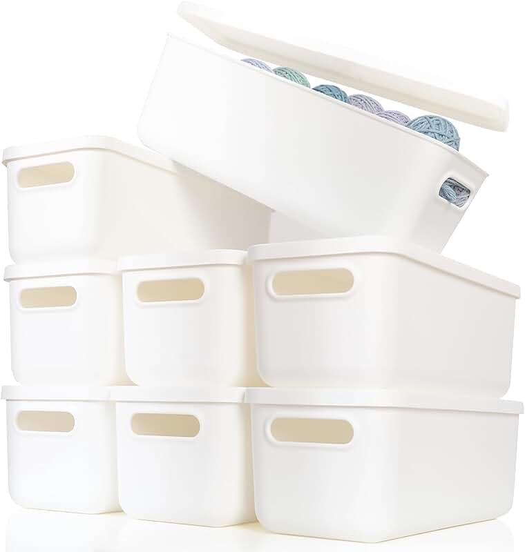 White plastic storage baskets with lids