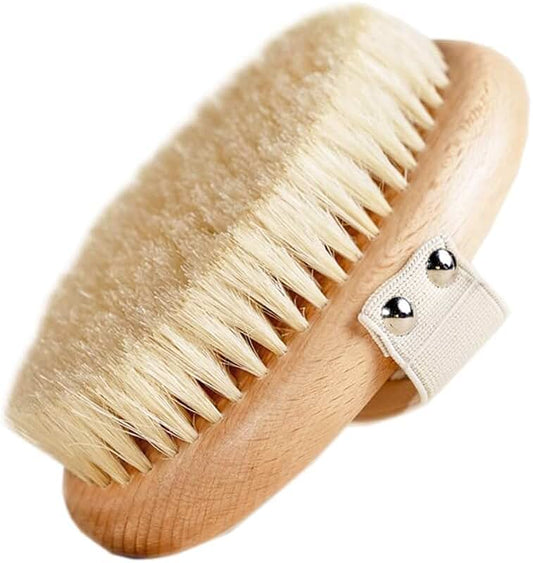 Body brush with strap for exfoliation and glow