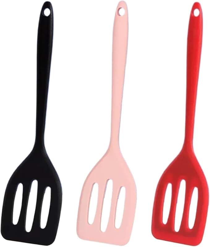 Pink silicone spatula for frying and cooking