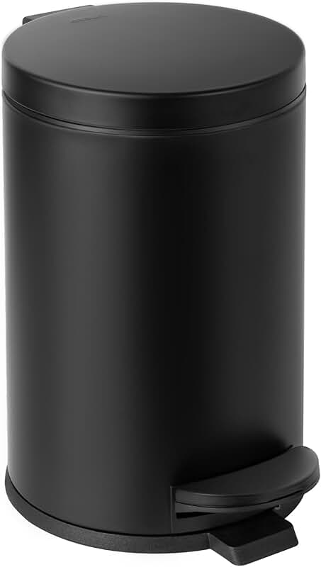 Small black bathroom trash can with lid and foot pedal