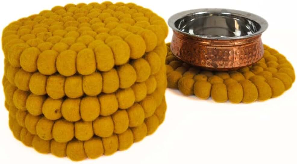 Round and square mustard-colored trivet for kitchen and dining