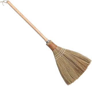 Small natural straw hand broom for indoor and outdoor cleaning