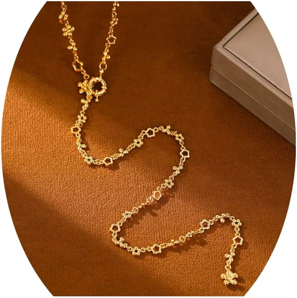 Elegant gold-tone Y-necklace with beaded chain