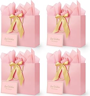 Pink gift bags with ribbons cards and tissue paper