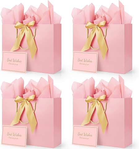 Pink gift bags with ribbons cards and tissue paper