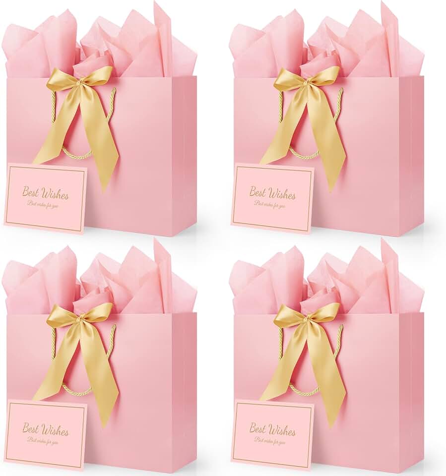 Pink gift bags with ribbons cards and tissue paper