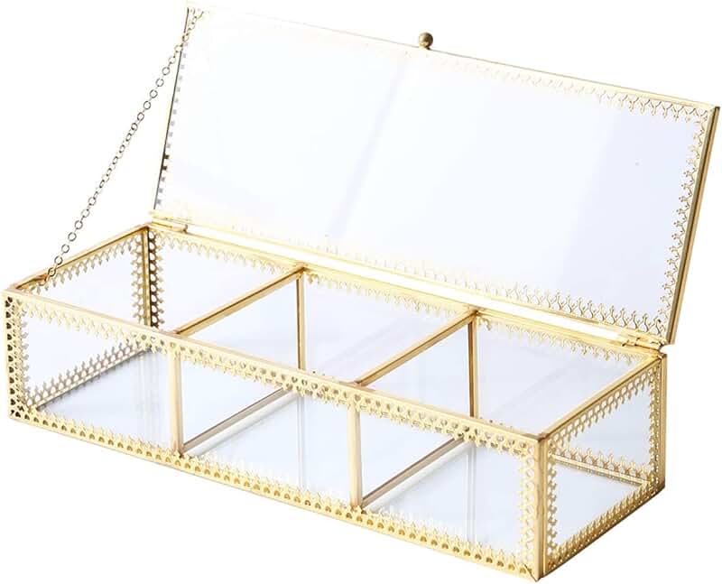 Vintage glass jewelry box with brass accents and lace design