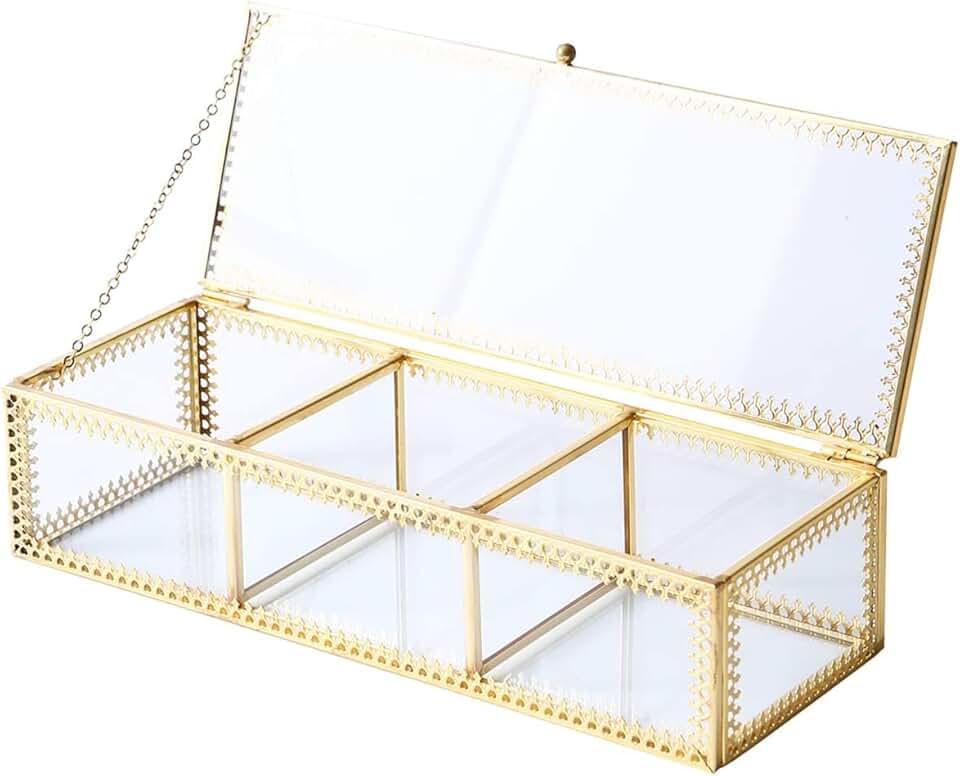 Vintage glass jewelry box with brass accents and lace design