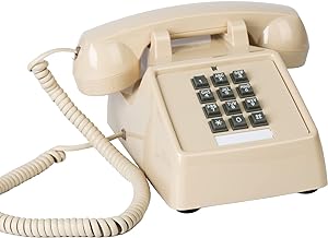 Vintage beige corded landline phone with mechanical ringer