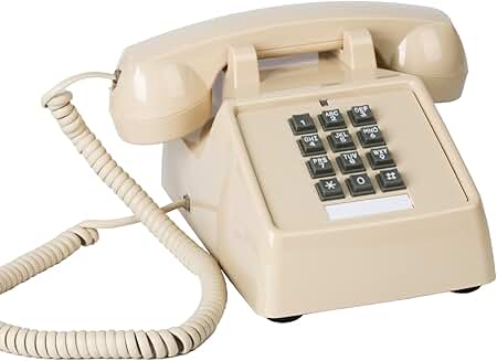 Vintage beige corded landline phone with mechanical ringer