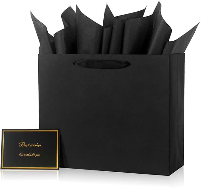 Elegant black gift bag with ribbon handles and accessories