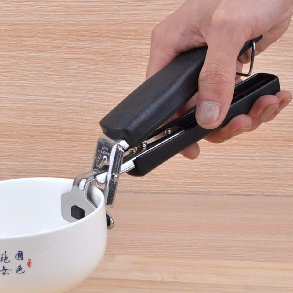 Camping cookware with handle clip and arm holder