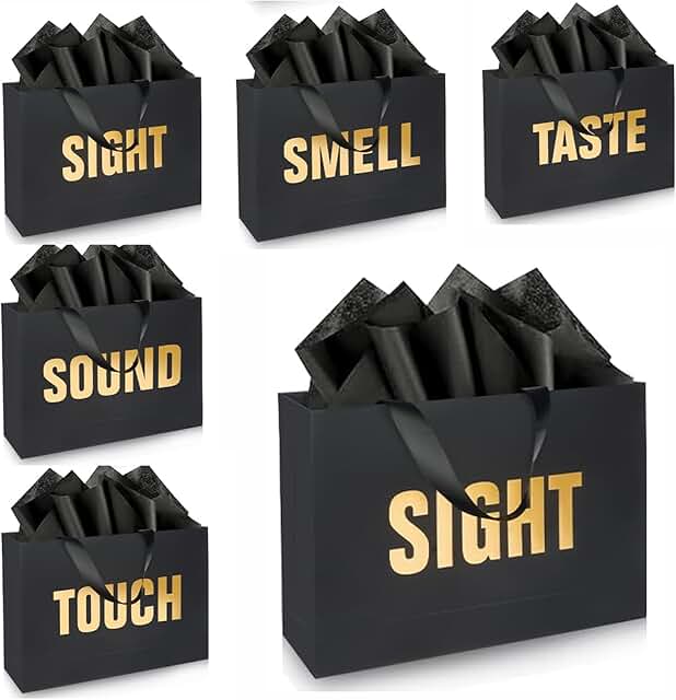 Gold foil gift bags with labels, envelopes, and cards