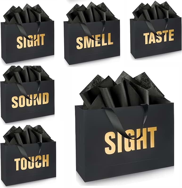Gold foil gift bags with labels, envelopes, and cards