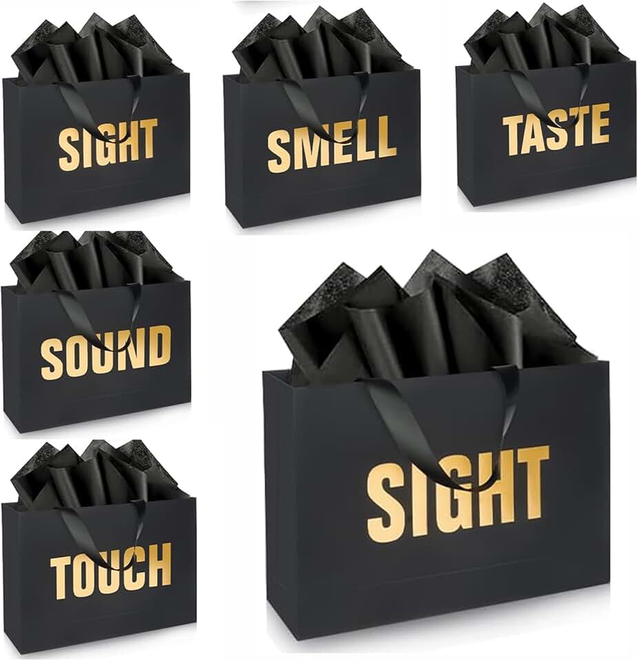 Gold foil gift bags with labels, envelopes, and cards