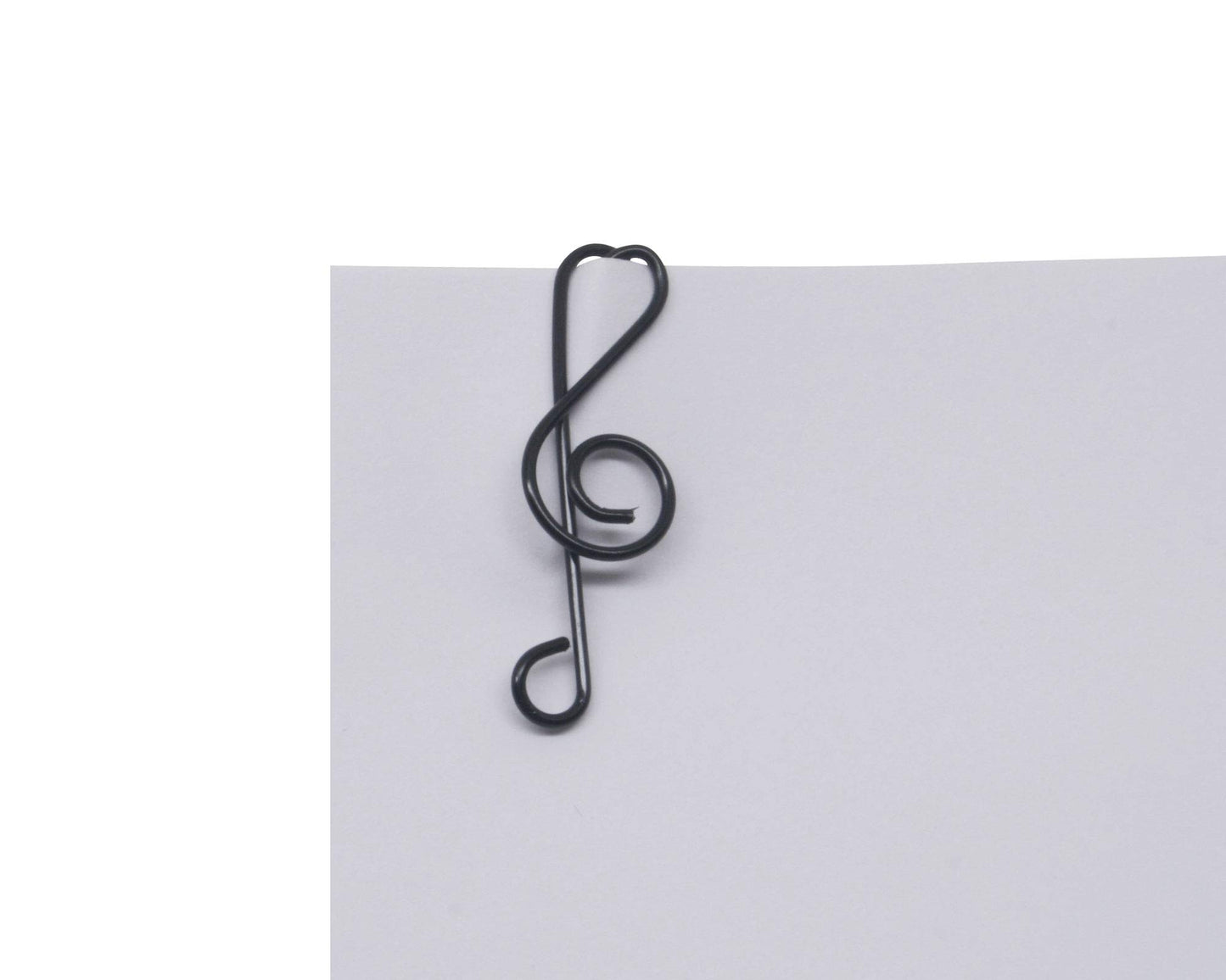 Music note shaped paper clips in round tin box