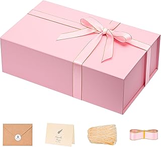 Pink gift box with filler, ribbon, and sticker