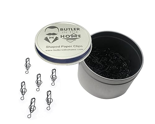 Music note shaped paper clips in round tin box