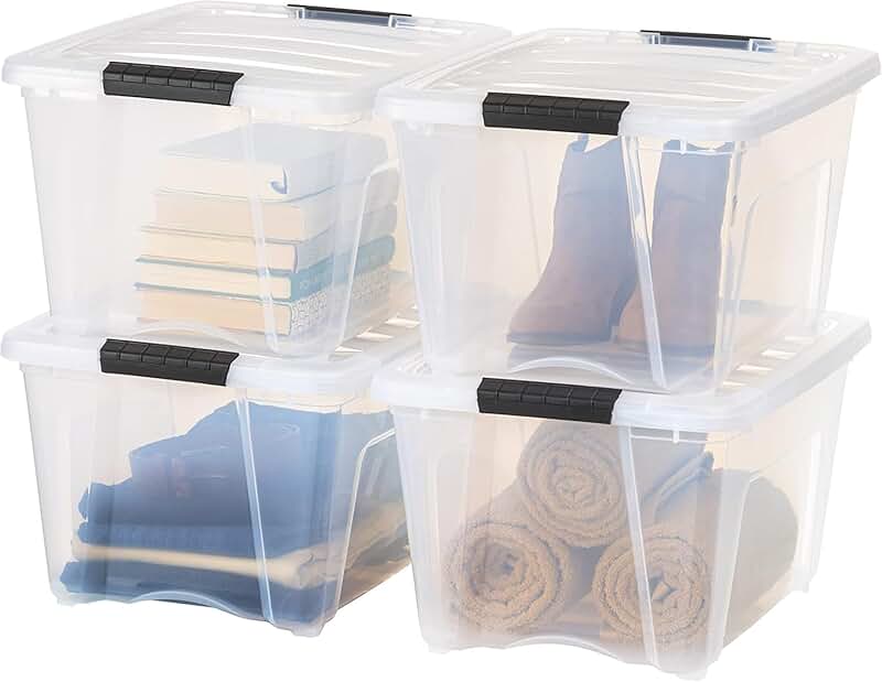Set of four clear stackable plastic storage bins