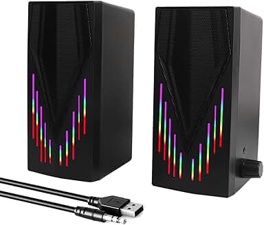 Black computer speakers with RGB lighting and aux cable