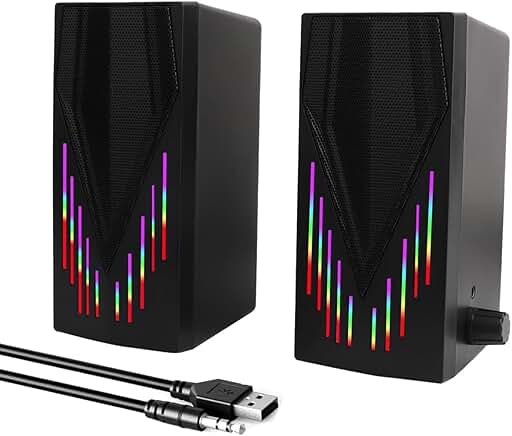 Black computer speakers with RGB lighting and aux cable
