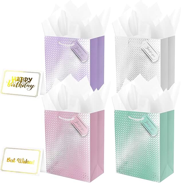 Set of four colorful gift bags with tissue paper handles