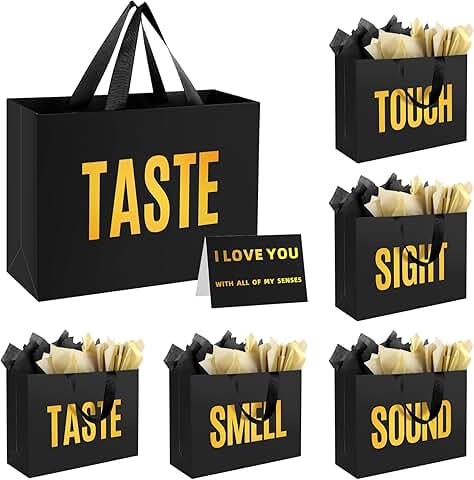 Medium black gift bag with labels and tissue paper