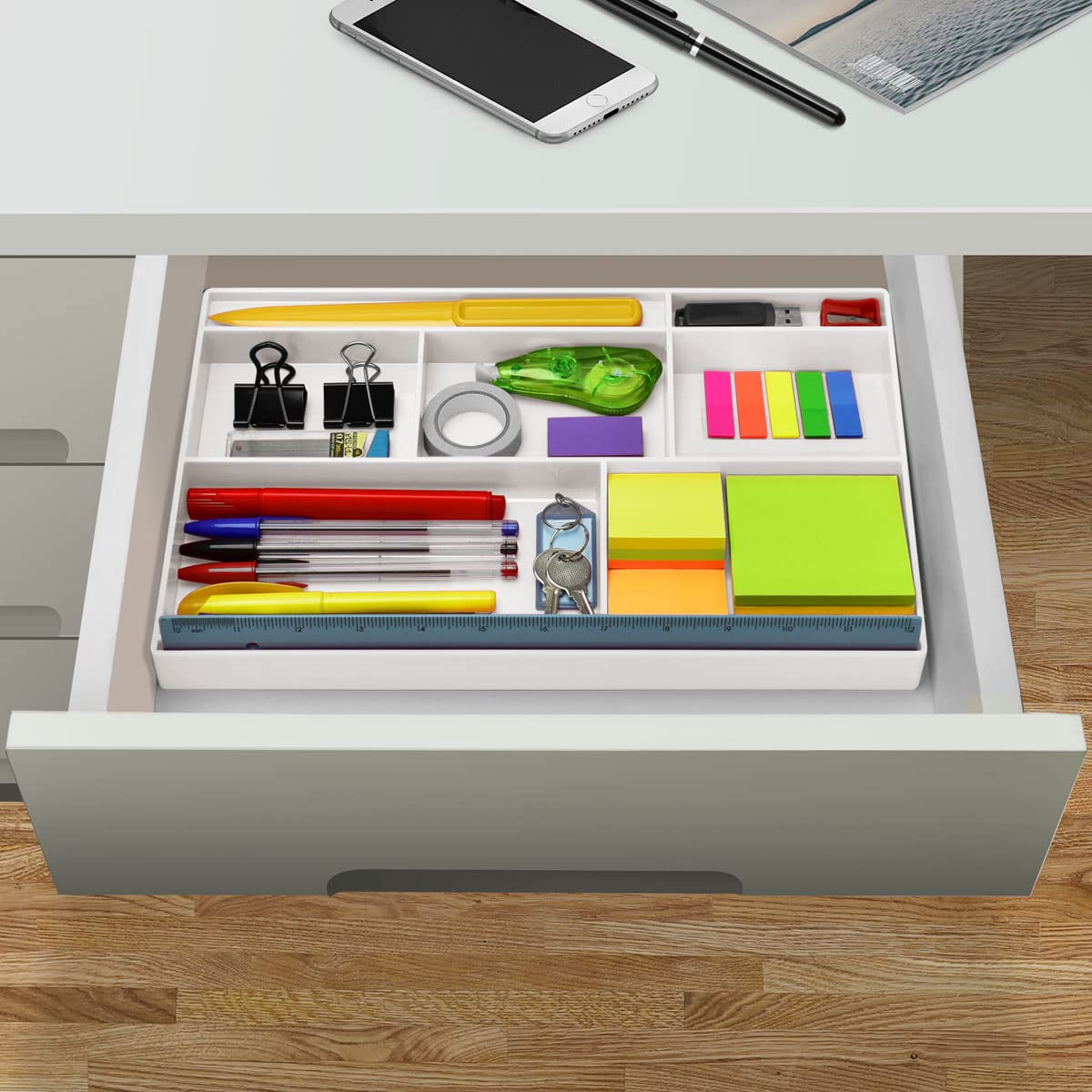 White plastic desk drawer organizer with 8 compartments