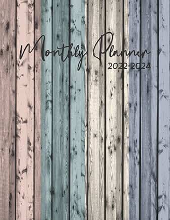 Monthly planner with 3-year calendar and holiday schedule