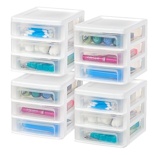 Set of four small white plastic stacking desk organizers