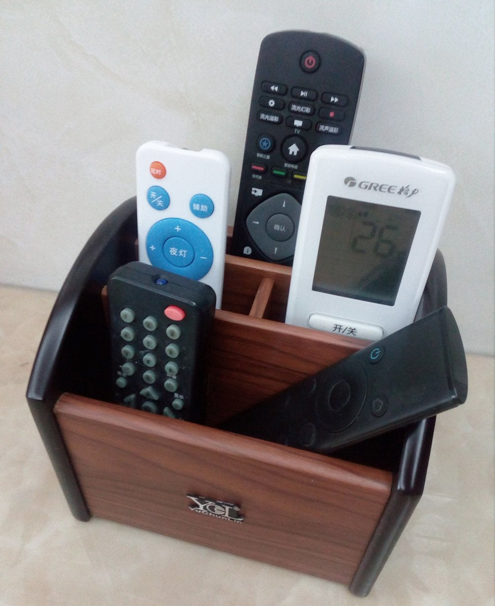 Rotating wooden remote and pen holder for desk