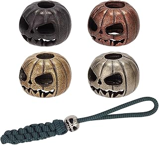 Set of four colorful pumpkin skull spacer beads