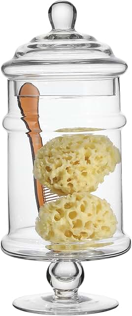 Clear glass apothecary jars for bathroom and wedding storage