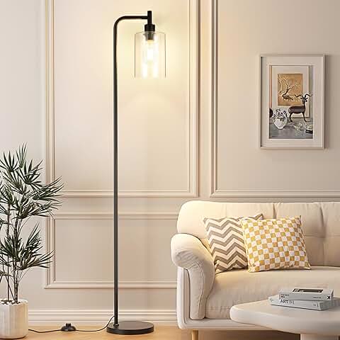 Black industrial floor lamp with glass shade and foot switch