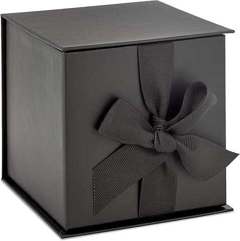 Small black gift box with bow and shredded paper fill