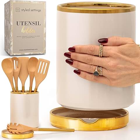 Large beige ceramic utensil holder with gold spoon rest