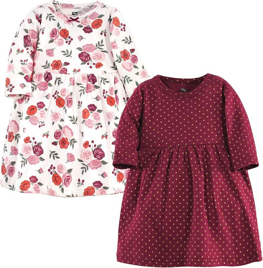 Two long-sleeve dresses for babies