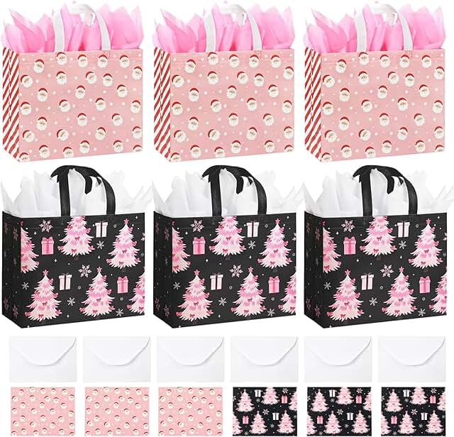 Six large pink Christmas gift bags with tissue and cards