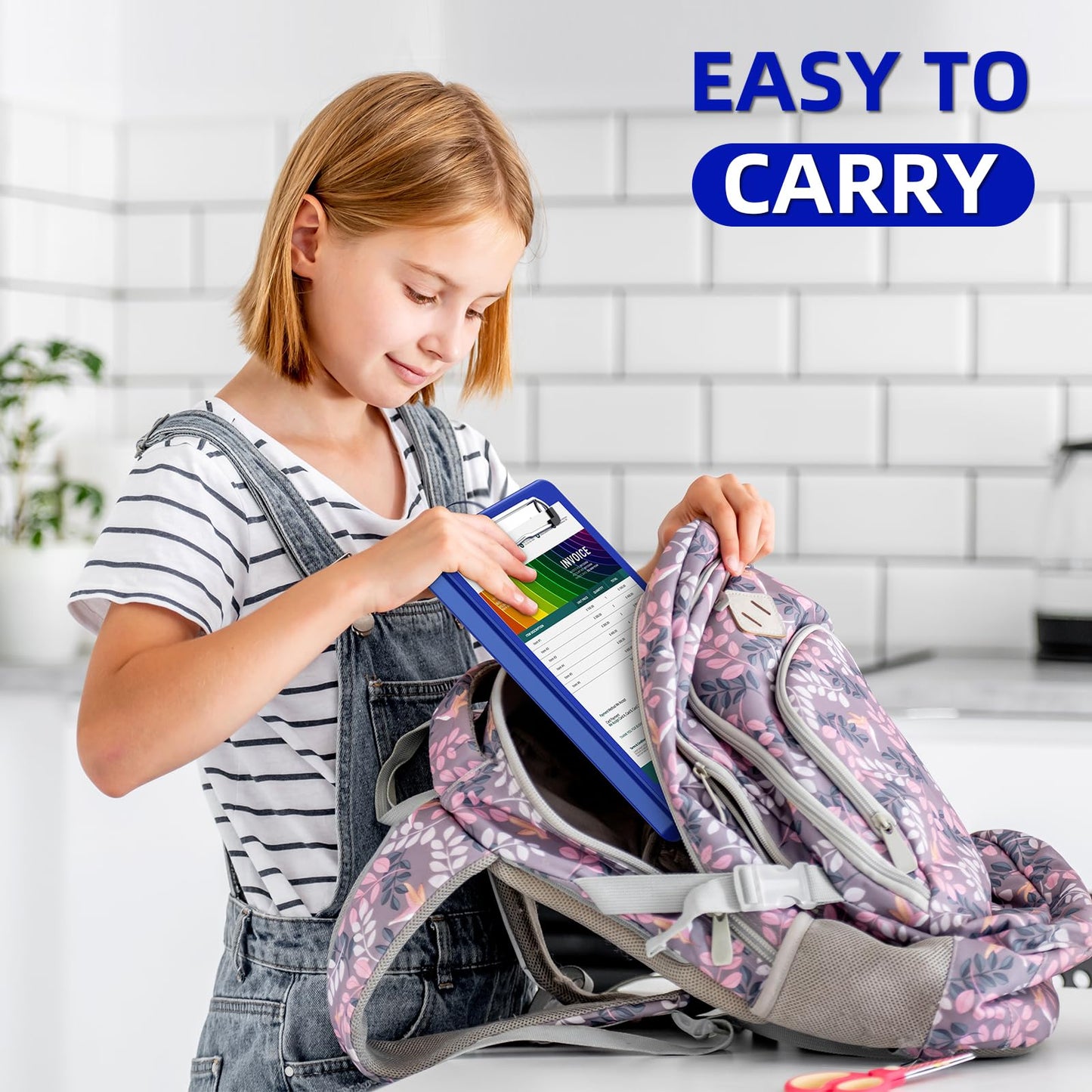 Slim plastic clipboard with storage and low profile clip