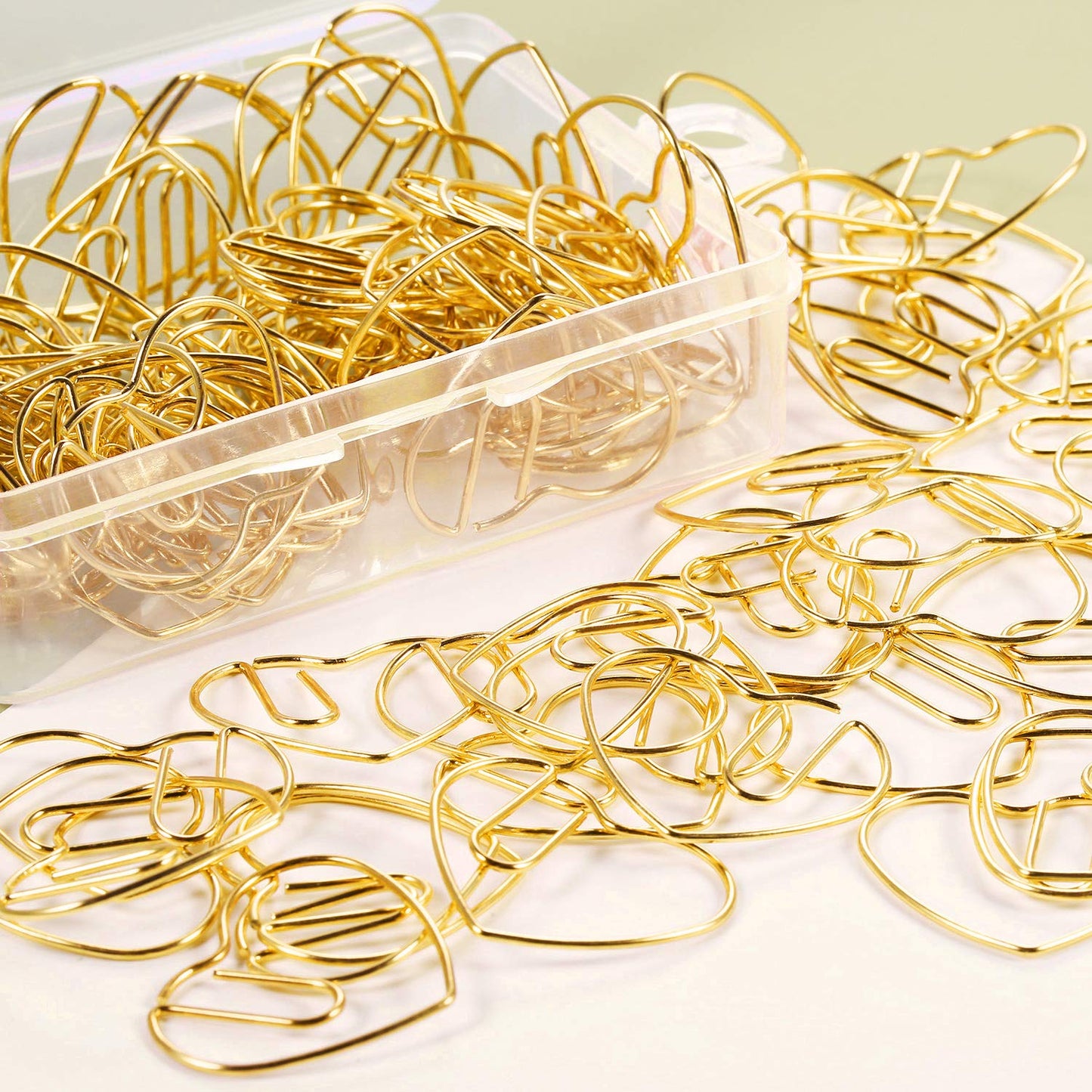 Set of 100 small heart-shaped metal paper clips