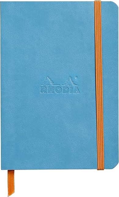 Soft turquoise dotted notebook with 144 pages