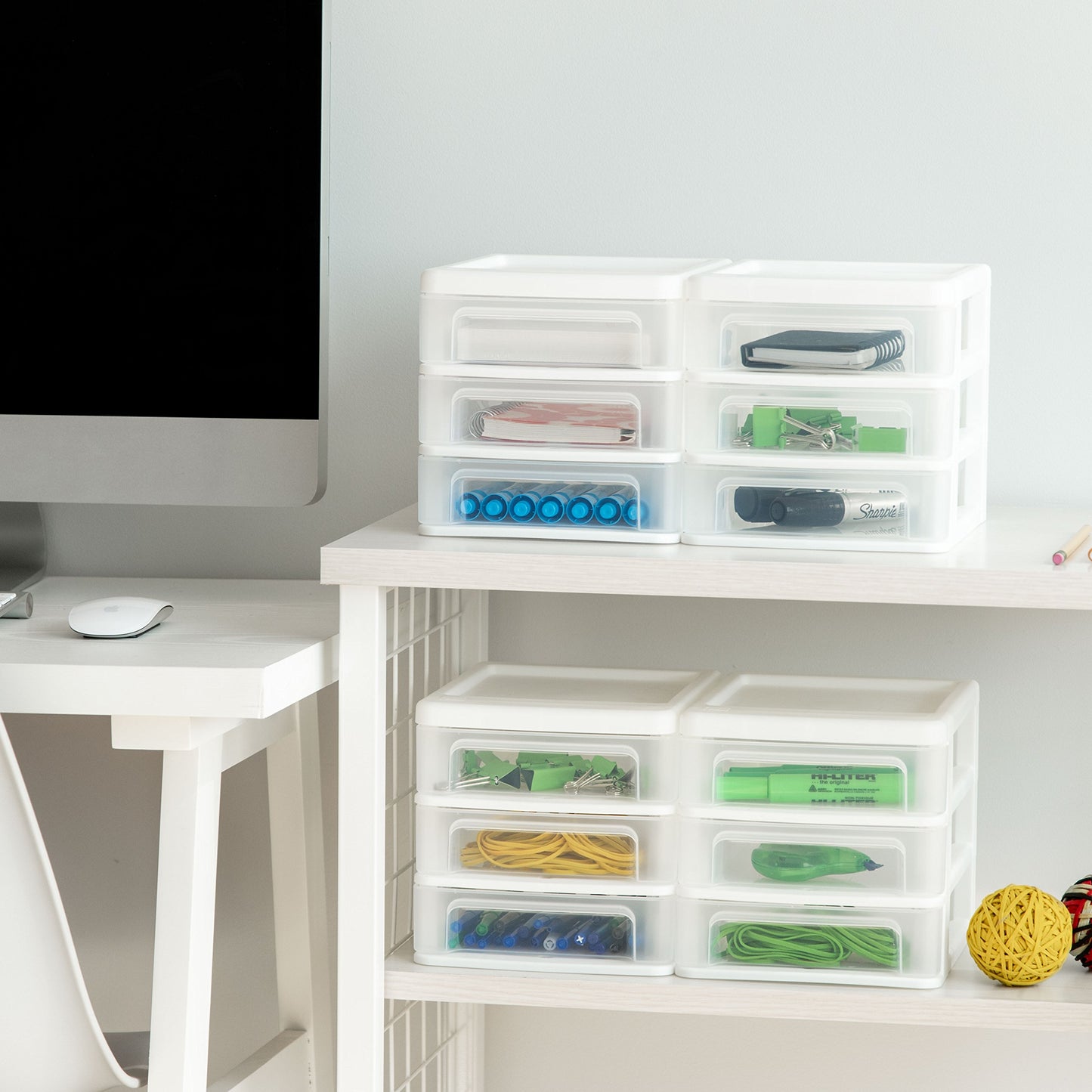 Set of four small white plastic stacking desk organizers