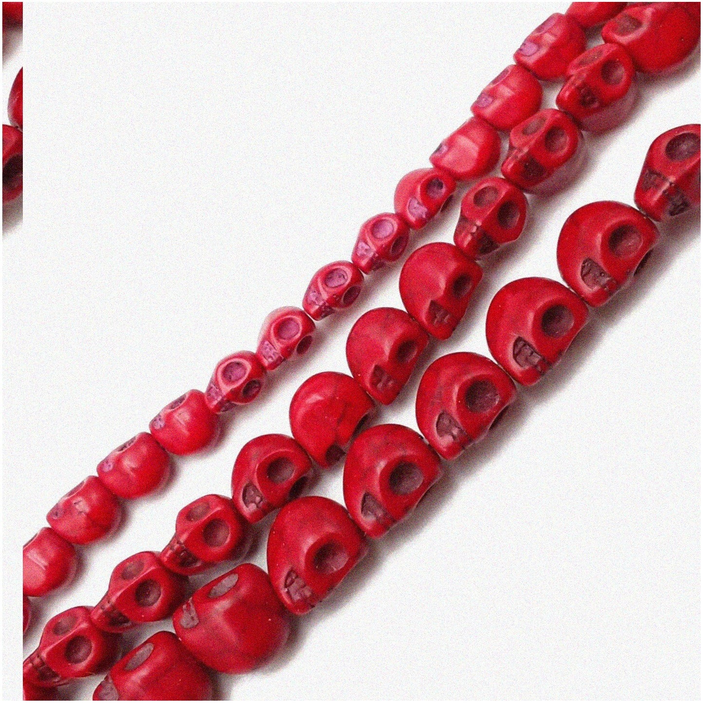 Turquoise Skull Strand with Red Magnesite Beads 6x8mm 15.5"